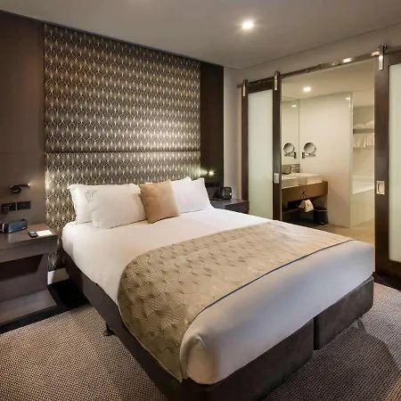 Pullman Brisbane Airport Hotel Exterior photo A bedroom at the hotel